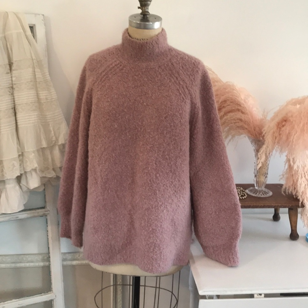 Pink turtleneck sweater